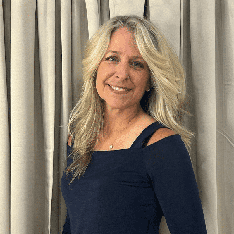 Portrait of Cyndee, a professional stylist at Changes Hair Studio, showcasing their expertise and style.