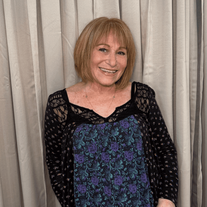 Portrait of Debbie, a professional stylist at Changes Hair Studio, showcasing their expertise and style.